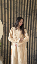 Beige kurti on the model
