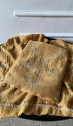 The folded set, kurta on top
