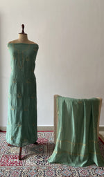 The set on the mannequin with its dupatta beside it