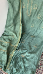 Fine chikankari with anar motifs and haath ki jaali across the body of the kurta piece
