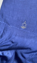 The kurta piece folded on the carpet