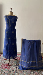 The set on the mannequin with its dupatta beside it