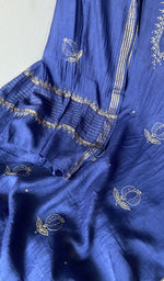 Fine chikankari with anar motifs and haath ki jaali across the body of the kurta piece