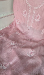 close view of the do taar and teen taar chikankari with anar motifs and haath ki jaali in the empty spaces