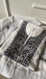 The folded set, kurta on top