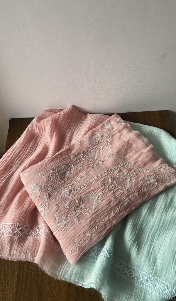 Pink pure mul chanderi kurta piece folded, fine front and back chikankari anarkali