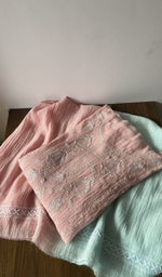 Pink pure mul chanderi kurta piece folded, fine front and back chikankari anarkali