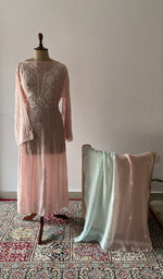 The set on the mannequin with its dupatta beside it