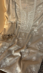 Beige tissue chanderi laid out flat