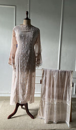 The set on the mannequin with its dupatta beside it