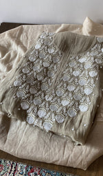 Load image into Gallery viewer, Grey pure mul chanderi kurta piece folded, fine chikankari in view