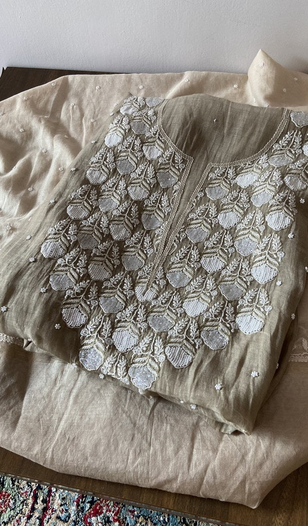 Grey pure mul chanderi kurta piece folded, fine chikankari in view