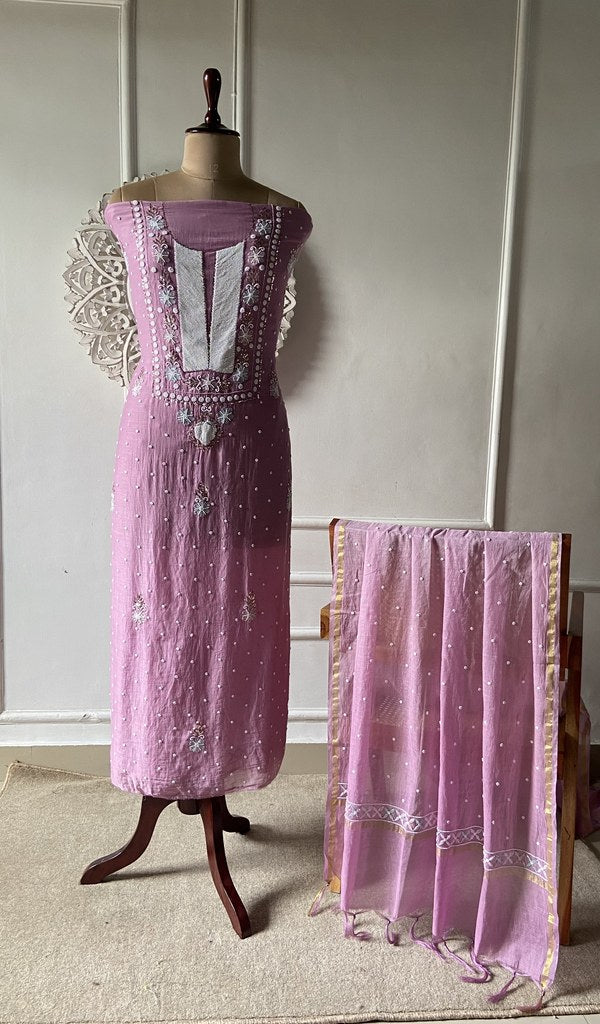 Mauve Pink suit set on the mannequin with its dupatta