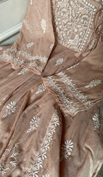 Hand jaali worked open across the panel