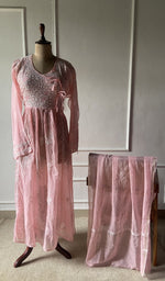 The set on the mannequin with its dupatta beside it