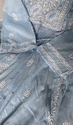 close view of the angarkha style with fine do and teen taar chikankari and mukaish work