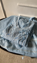 border and hem of the blue kurta piece