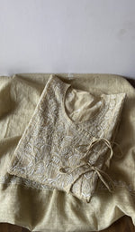 Folded green pure mul chanderi kurta piece with chikankari on the panel