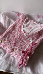 Folded kurta piece and dupatta, chikankari along the hem