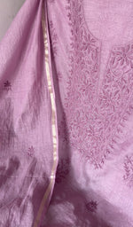 The kurta piece folded on the carpet