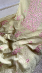 close view of the fine coloured chikankari with unique motifs
