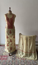 The set on the mannequin with its dupatta beside it