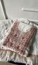 The folded set, kurta on top