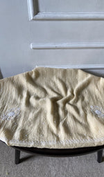 Bottom fabric draped over the stool