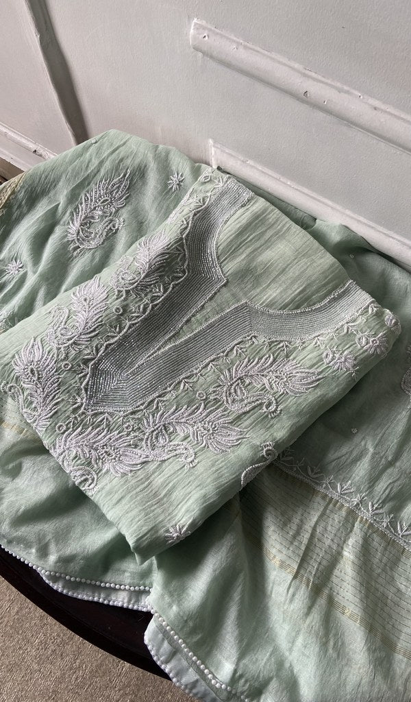 Green pure mul chanderi kurta piece folded, fine chikankari