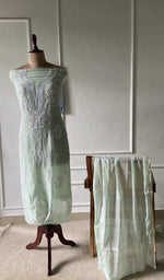 The set on the mannequin with its dupatta beside it
