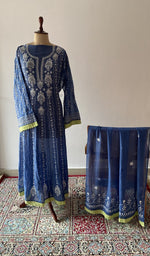 The set on the mannequin with its dupatta beside it
