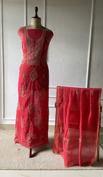 red pure mul chanderi chikankari set on the mannequin with the dupatta