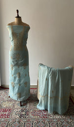The set on the mannequin with its dupatta beside it