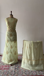 The set on the mannequin with its dupatta beside it