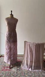 The set on the mannequin with its dupatta beside it