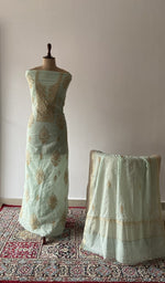 The set on the mannequin with its dupatta beside it