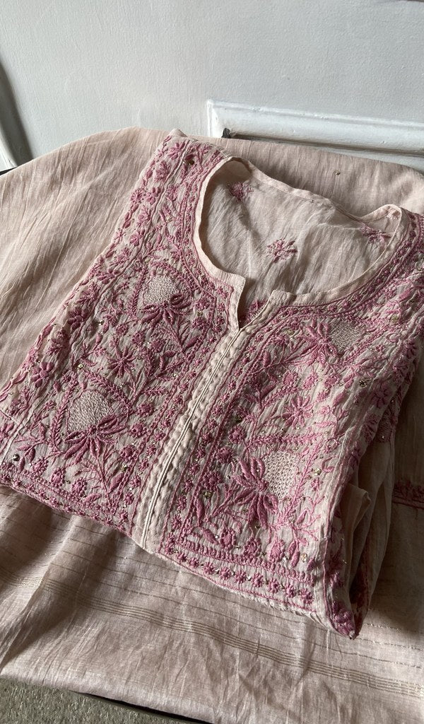 pink pure mul chanderi chikankari suit set, folded