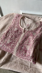 pink pure mul chanderi chikankari suit set, folded