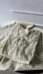 green pure mul chanderi kurta piece folded, do taar and teen taar chikankari with haath ki jaali on semi