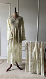 The set on the mannequin with its dupatta beside it