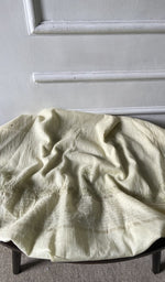 Bottom fabric draped over the stool