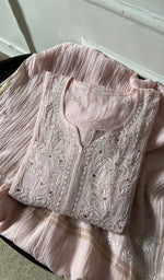 Pink pure mul chanderi kurta piece folded, fine chikankari with haath ki jaali on semi-stitched