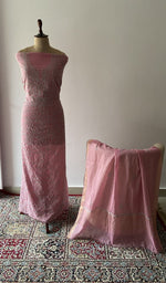 The set on the mannequin with its dupatta beside it