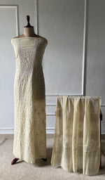 The set on the mannequin with its dupatta beside it