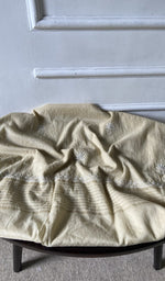 Bottom fabric draped over the stool
