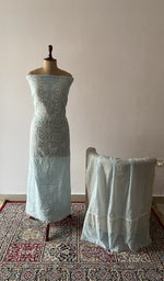 The set on the mannequin with its dupatta beside it