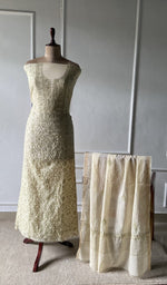 The set on the mannequin with its dupatta beside it