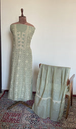 The set on the mannequin with its dupatta beside it