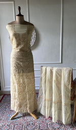 Cream pure mul chanderi chikankari 3 pc unstitched suit set laid out