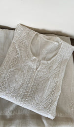 White mul chanderi kurta piece folded, gala work in front